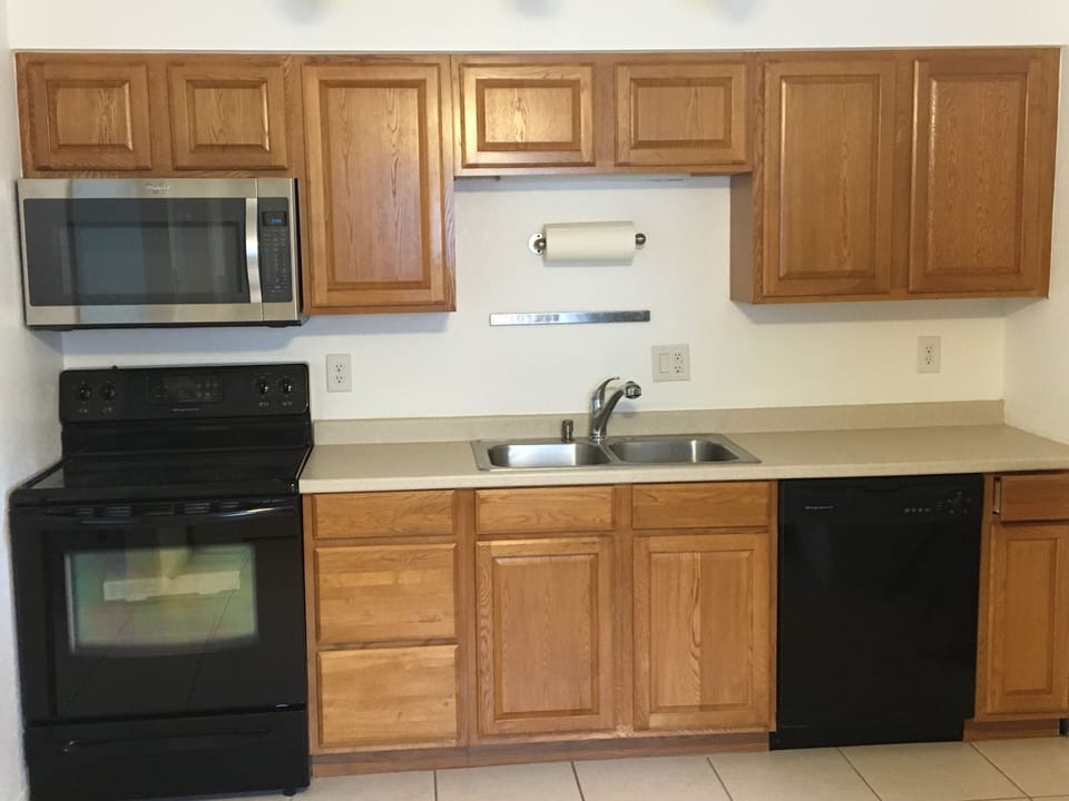 Kitchen with microwave, oven, dishwasher and fridge (not pictured)