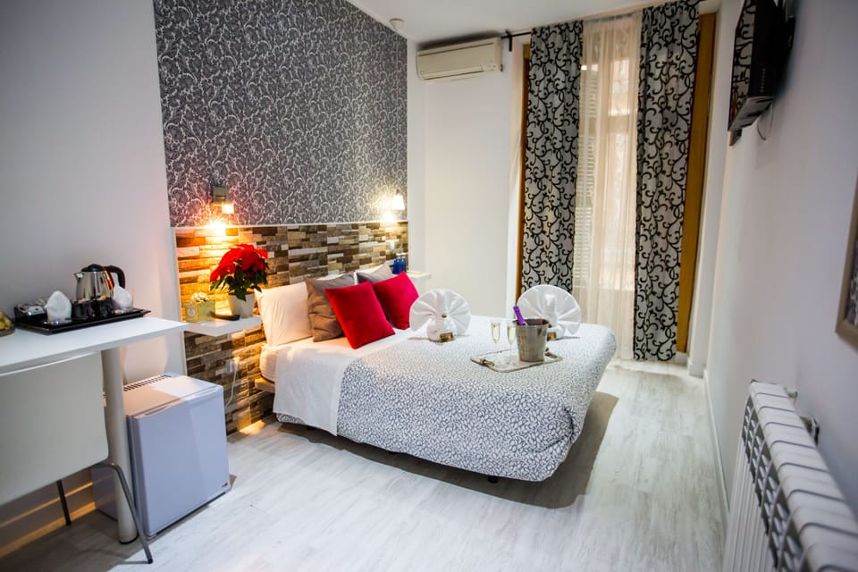 Classic Double Room, Balcony | In-room safe, desk, free WiFi, bed sheets