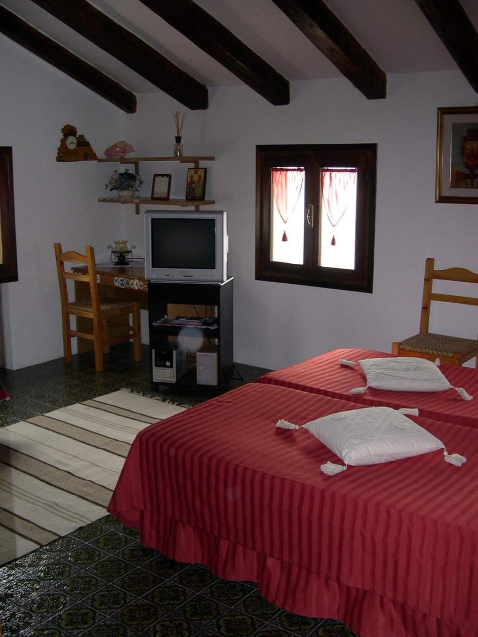 Minibar, desk, cribs (free), rollaway beds (surcharge)