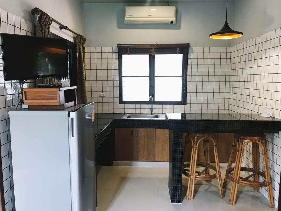 Superior Double Room, Pool View | Private kitchen | Fridge, electric kettle
