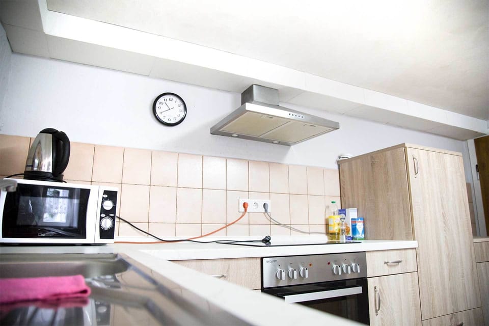 Condo, 4 Bedrooms | Private kitchen | Coffee/tea maker, full-size fridge, microwave, oven