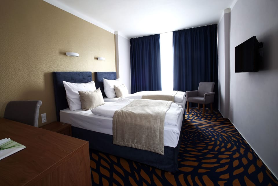 Double Room | Minibar, in-room safe, desk, rollaway beds