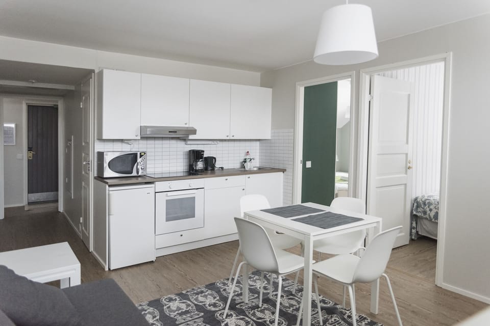 Family Apartment, 2 Bedrooms, Non Smoking | Private kitchen | Shared fridge, microwave