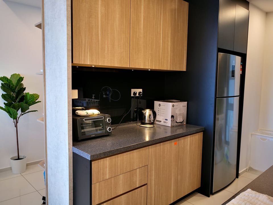 Exclusive Apartment, 2 Bedrooms, City View | Private kitchen | Full-size fridge, stovetop, electric kettle, cookware/dishes/utensils