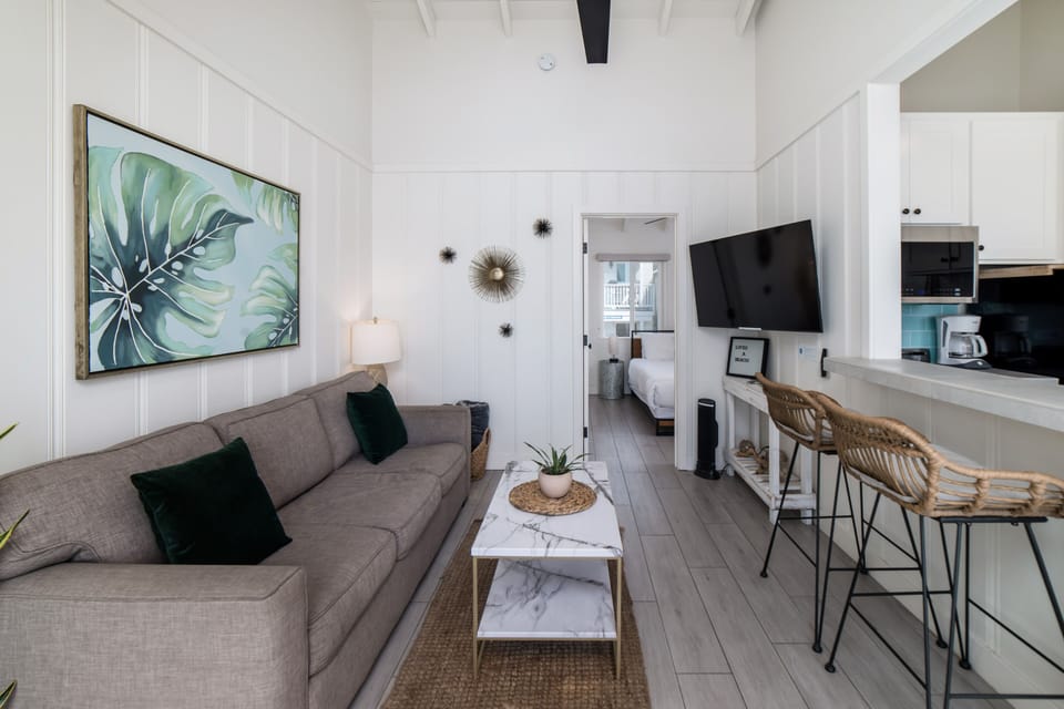 Ocean view living room with smart television. Netflix and HULU with Live TV accounts signed in for guest use.