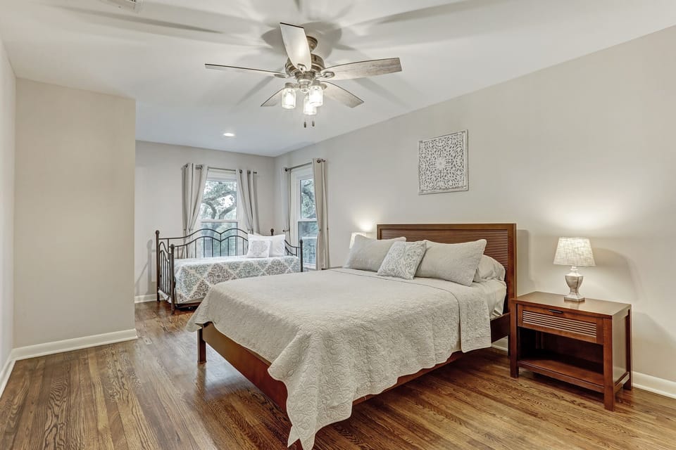 Bedroom #2 with one queen size bed and two twin (daybed)