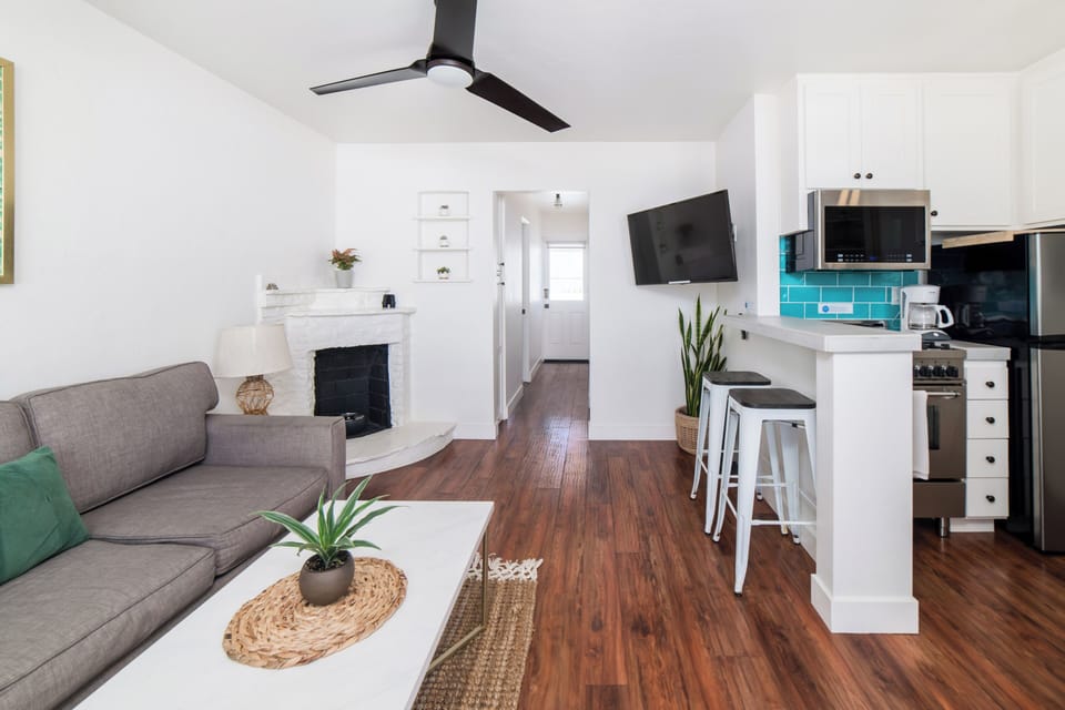 Ocean view living room with smart television. Netflix and HULU with Live TV accounts signed in for guest use.