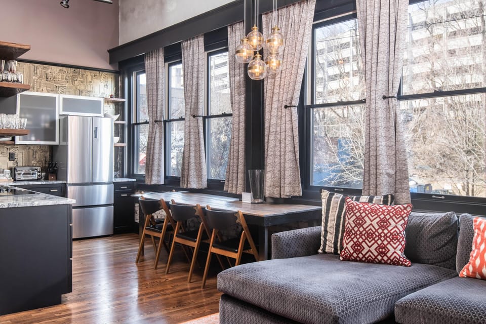 The apartment accommodates three guests with the king bed and sofa (bedding provided for sofa). It is not a pullout. 