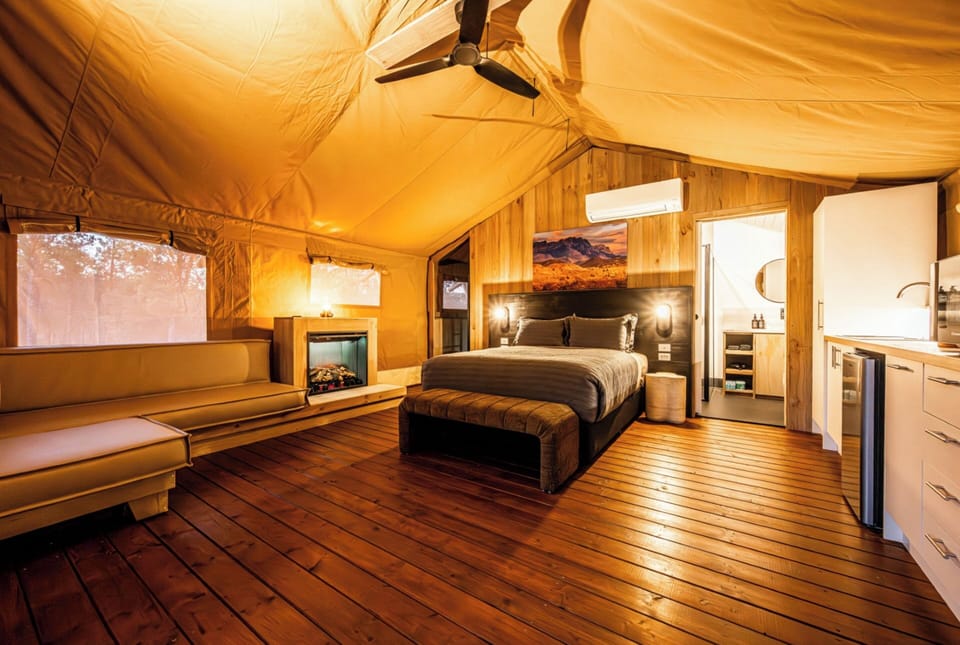 Deluxe Tent (Safari) | Blackout drapes, iron/ironing board, bed sheets