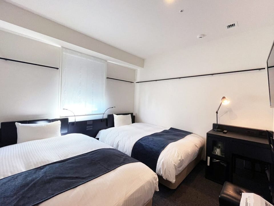 Superior Twin Room, Non Smoking | Down comforters, in-room safe, blackout drapes, iron/ironing board
