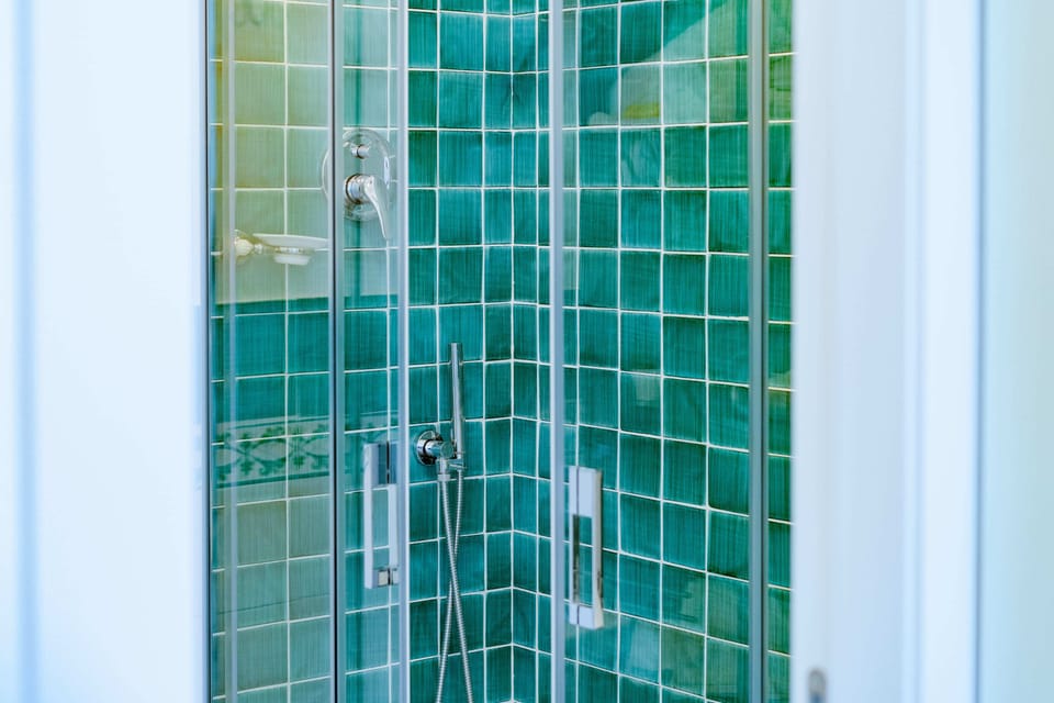 Superior Double Room, 1 King Bed | Bathroom | Shower, rainfall showerhead, designer toiletries, hair dryer