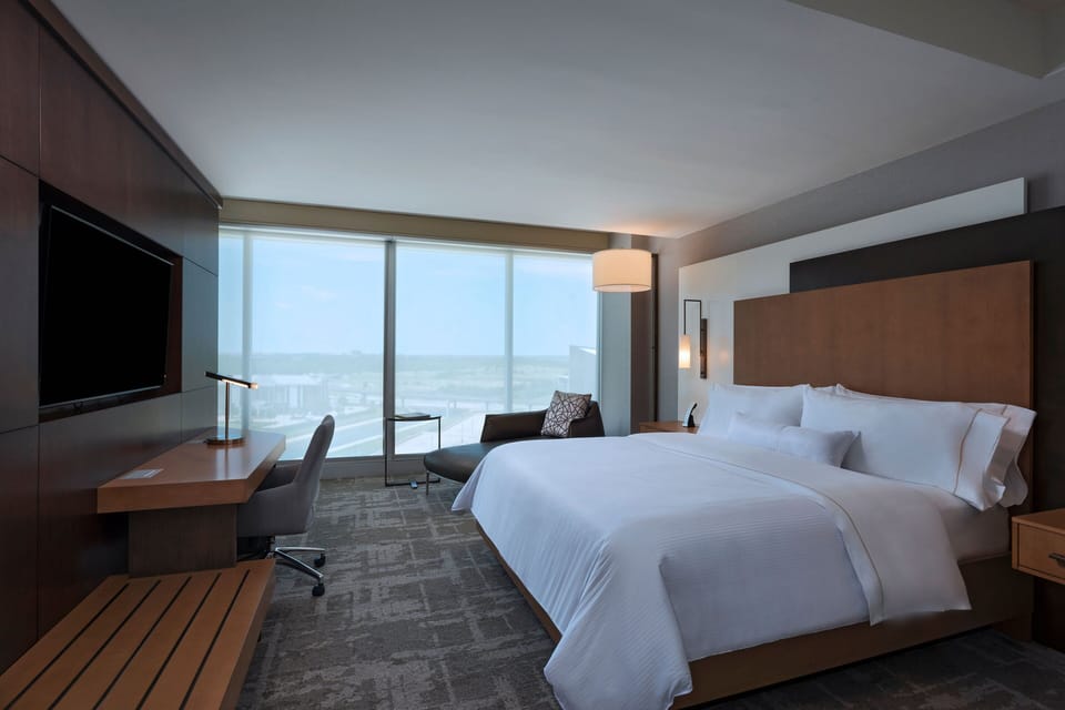Down comforters, pillowtop beds, in-room safe, desk