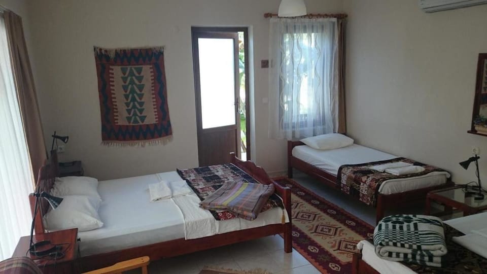 Standard Triple Room | Minibar, in-room safe, free WiFi