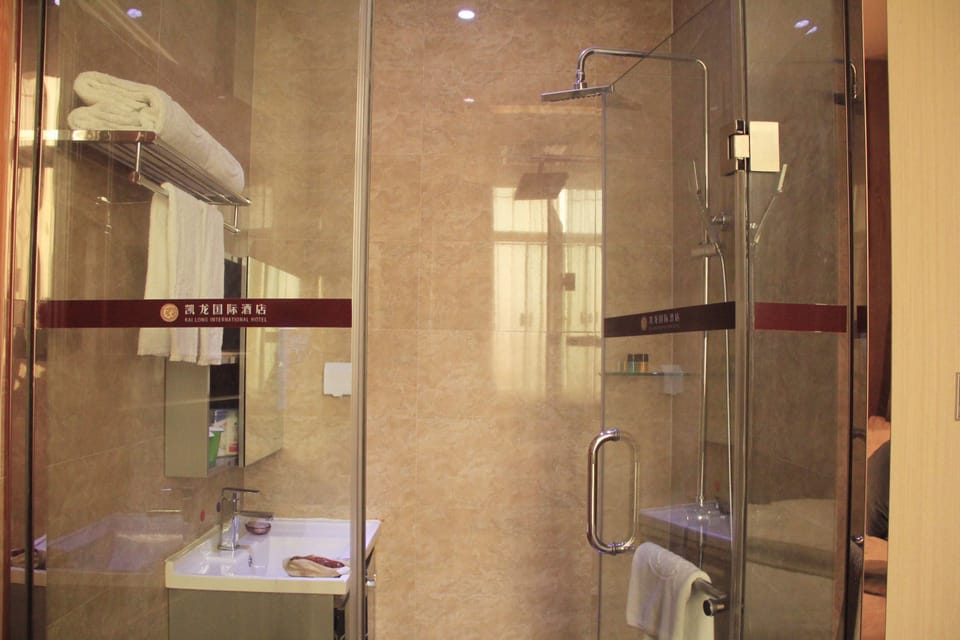 Shower, free toiletries, hair dryer, slippers