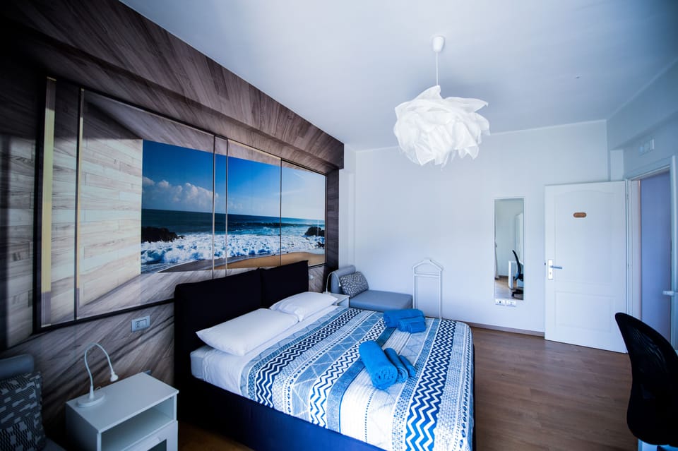 Quadruple Room, Shared Bathroom (External) | Rollaway beds, free WiFi, bed sheets