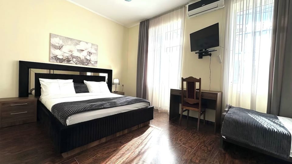 Basic Triple Room, 3 Bedrooms, Private Bathroom | Premium bedding, minibar, desk, blackout drapes