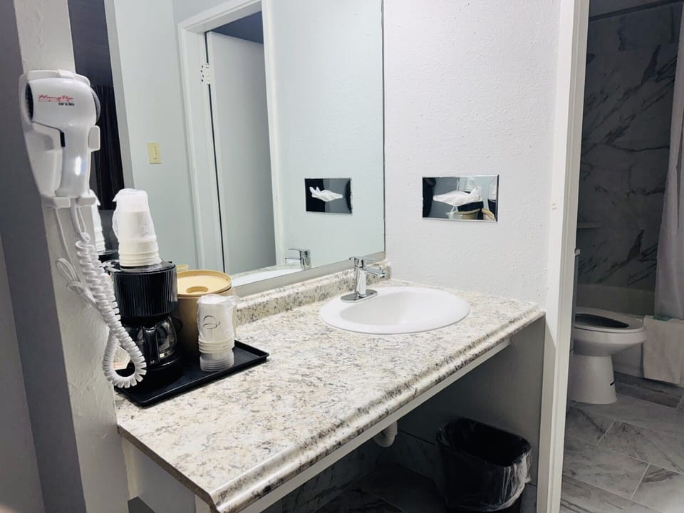 Desk, blackout drapes, iron/ironing board, WiFi (free)