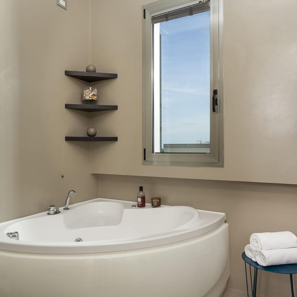 Shower, free toiletries, hair dryer, slippers