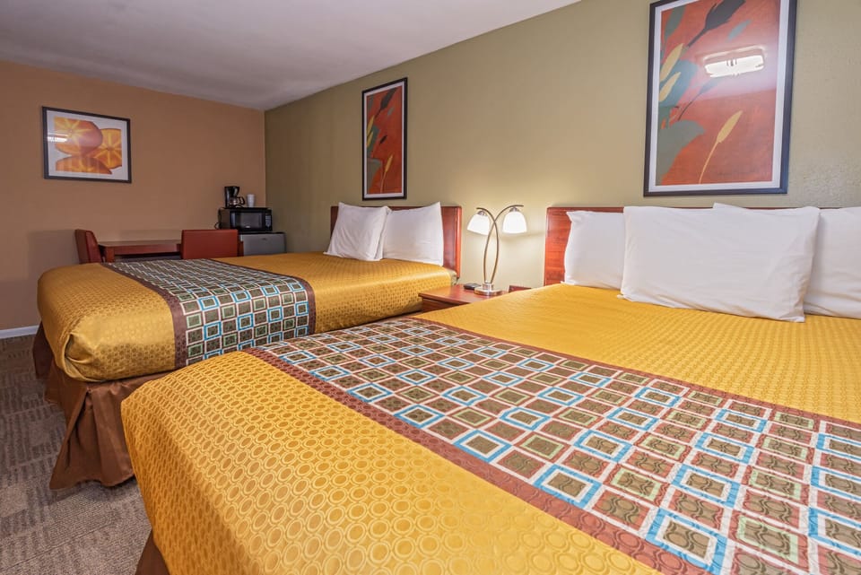 Economy Double Room, 2 Queen Beds | Desk, soundproofing, WiFi (free), bed sheets
