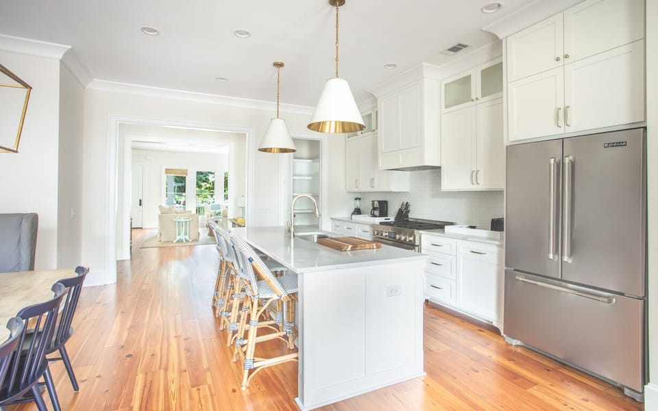 Stainless steel appliances and marble countertops.