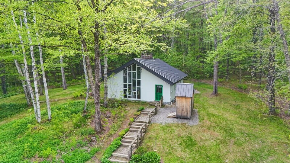 A-frame front exterior with stone steps