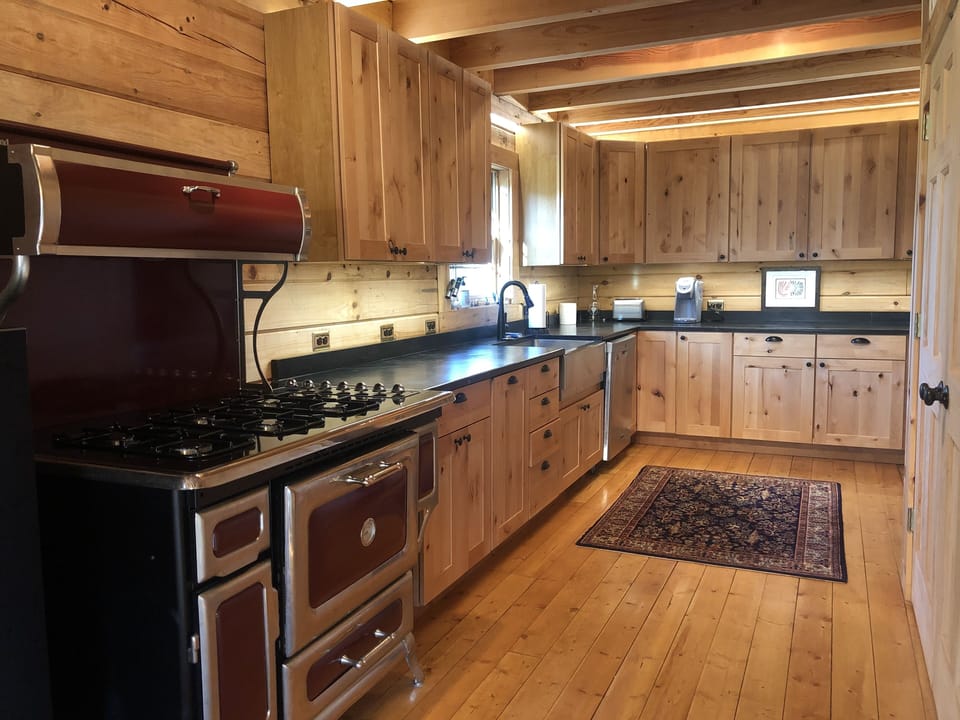 Gourmet Kitchen... this is not a rustic hunting cabin!  Local Soapstone counters
