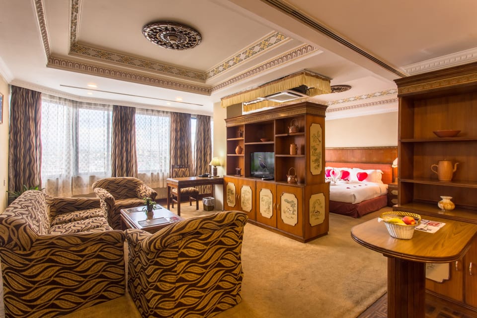 Suite | In-room safe, desk, laptop workspace, soundproofing