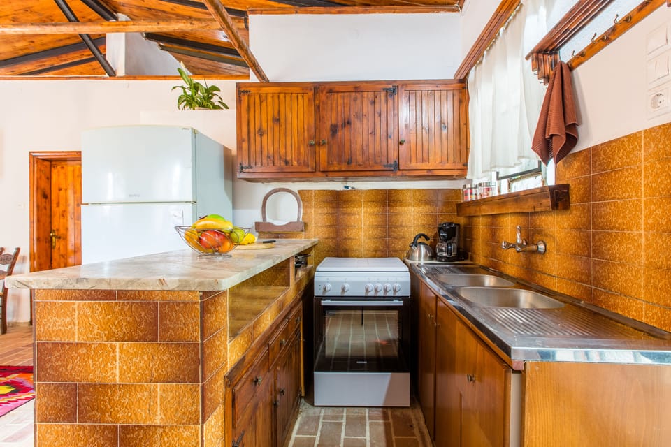 Villa, 2 Bedrooms, Sea View | Private kitchen | Full-size fridge, stovetop, coffee/tea maker, electric kettle