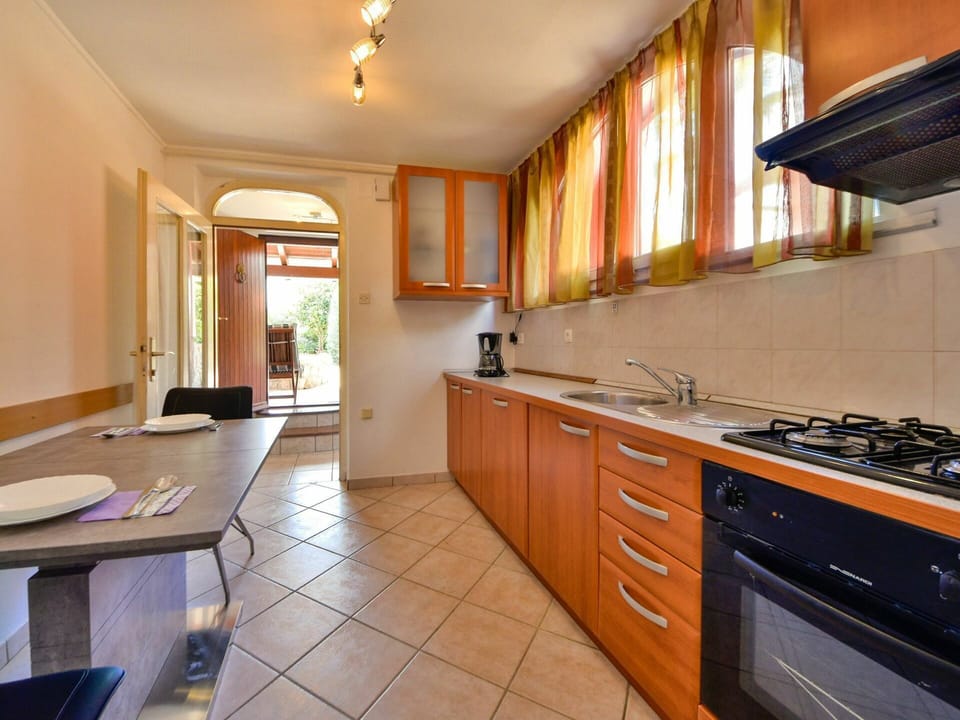 Cabinetry, Furniture, Property, Building, Countertop, Window, Wood, Tap, Sink, Kitchen Stove