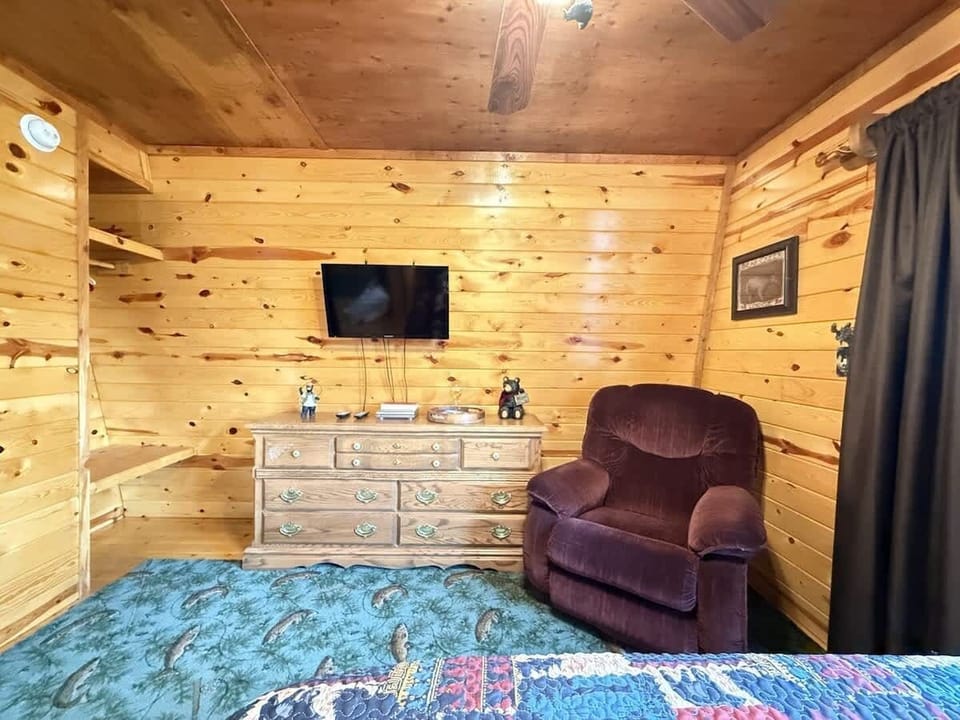 First Bedroom with queen bed and comfortable recliner for some needed relaxation.