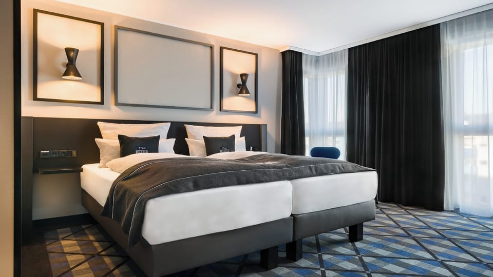 In-room safe, blackout drapes, soundproofing, free cribs/infant beds