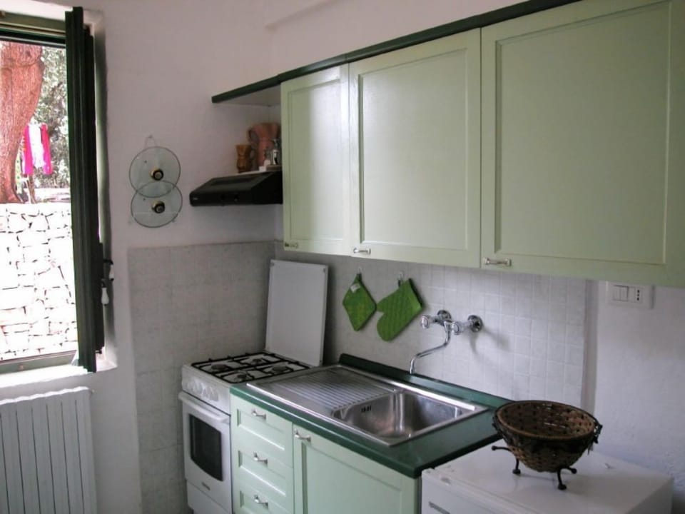 Apartment (Degli Ulivi) | Private kitchenette | Fridge, oven, stovetop, coffee/tea maker