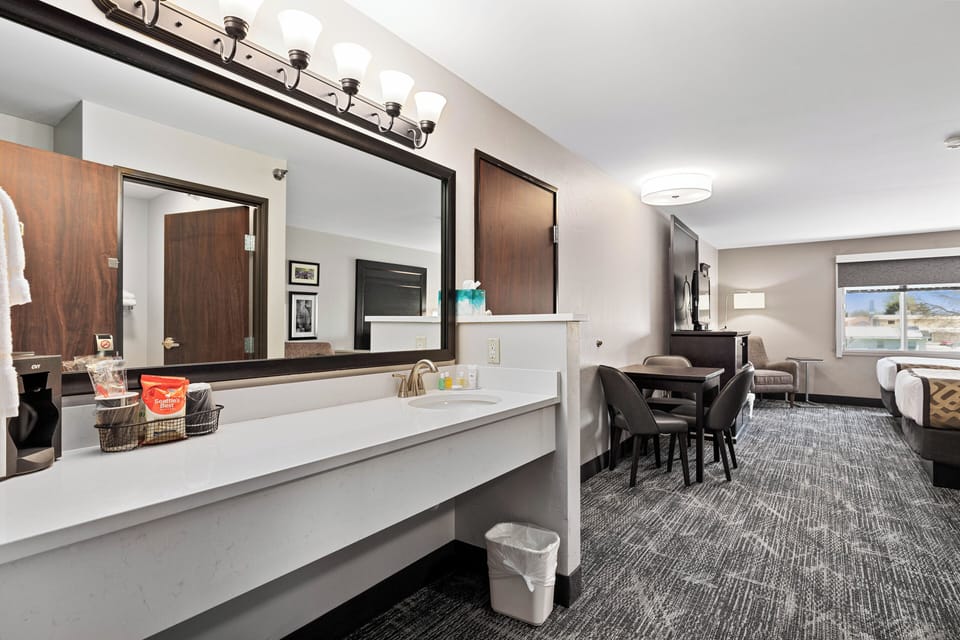 Deluxe Room, 2 Queen Beds (2 Queen Beds and a pull out sofabed) | In-room safe, blackout drapes, iron/ironing board, WiFi (free)