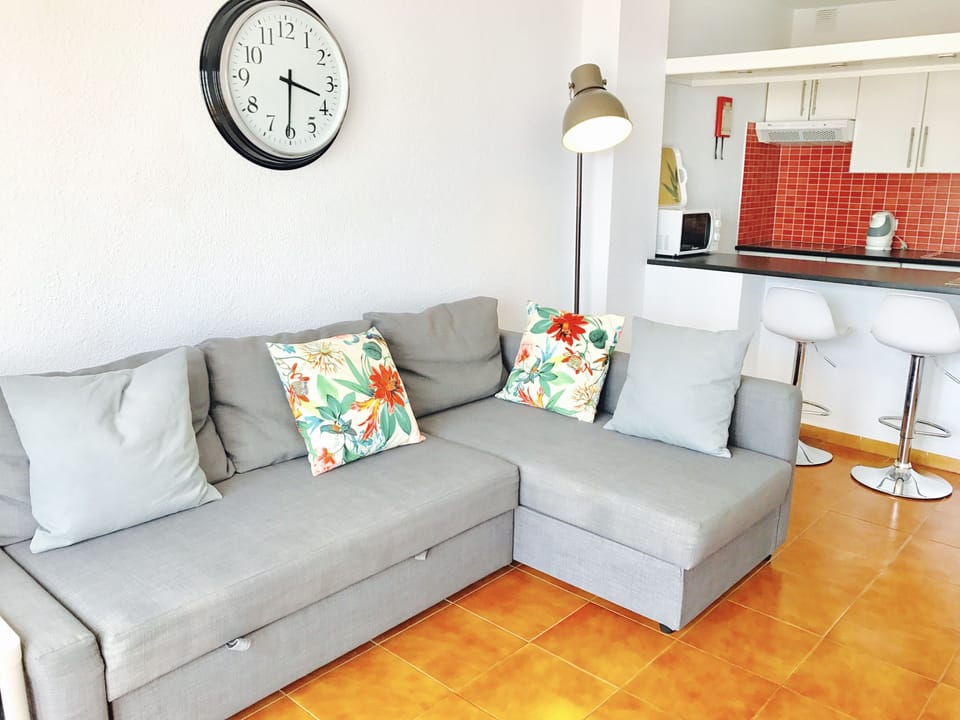 Standard One Bedroom | Living area | Flat-screen TV