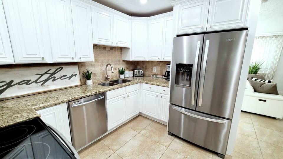 Light Bright Clean Kitchen Next to the Living Room
