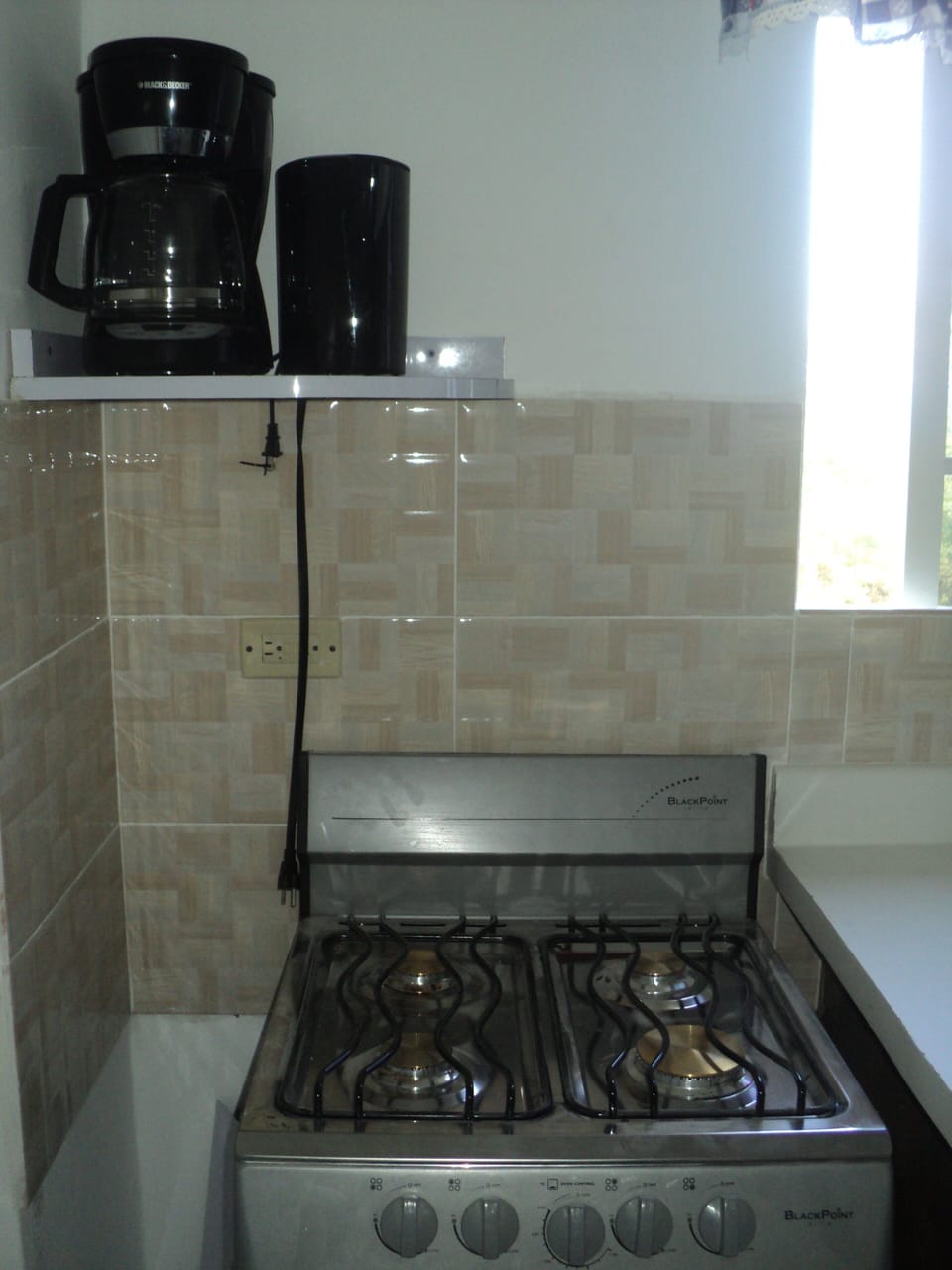 Stove with oven, coffee maker and kettle 