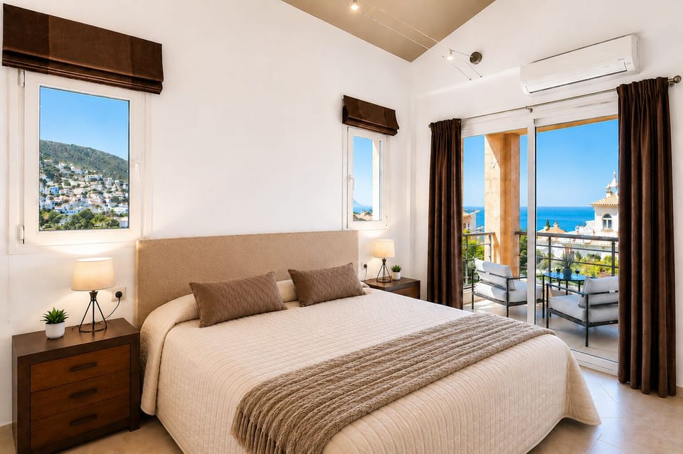 Master bedroom with private balcony.