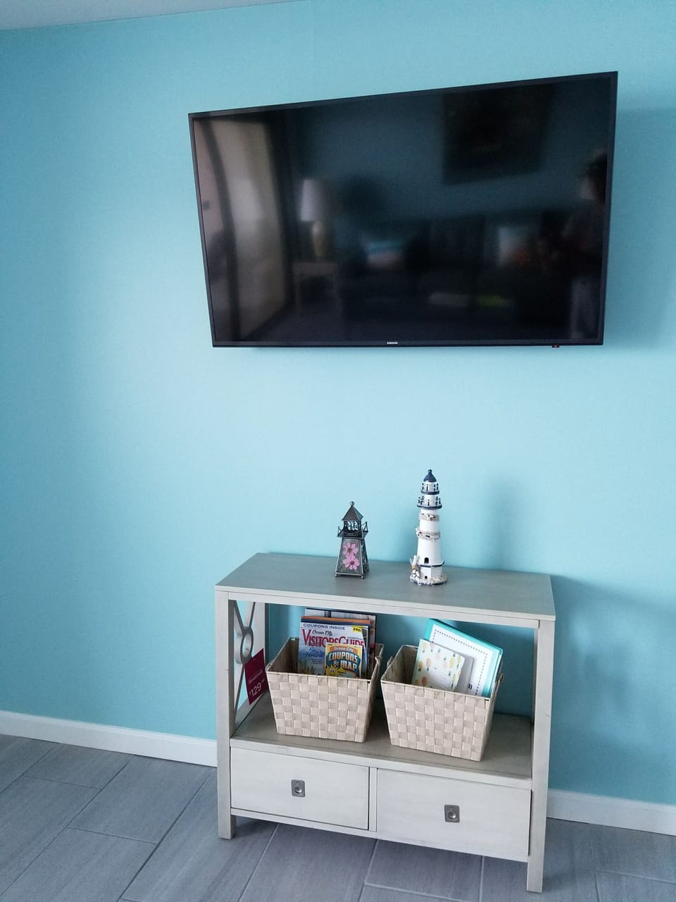50-inches TV wall mounted in the living area