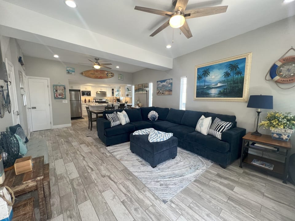 LIVING ROOM WITH SLEEPER SOFA