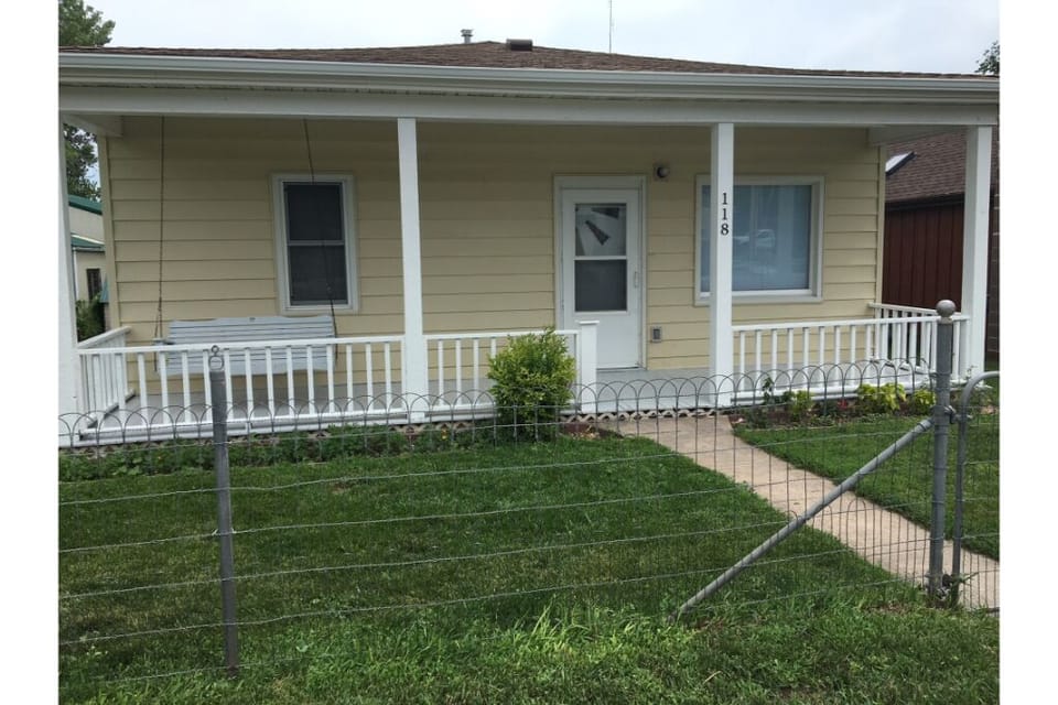 Adorable front porch with swing!