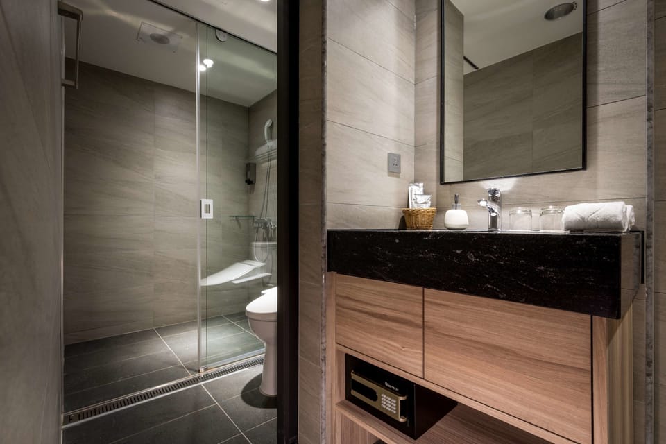 Shower, free toiletries, hair dryer, slippers