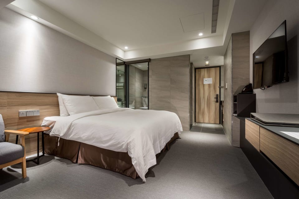 Park View Double Room (Facing the Spring Square View) | Down comforters, in-room safe, desk, laptop workspace
