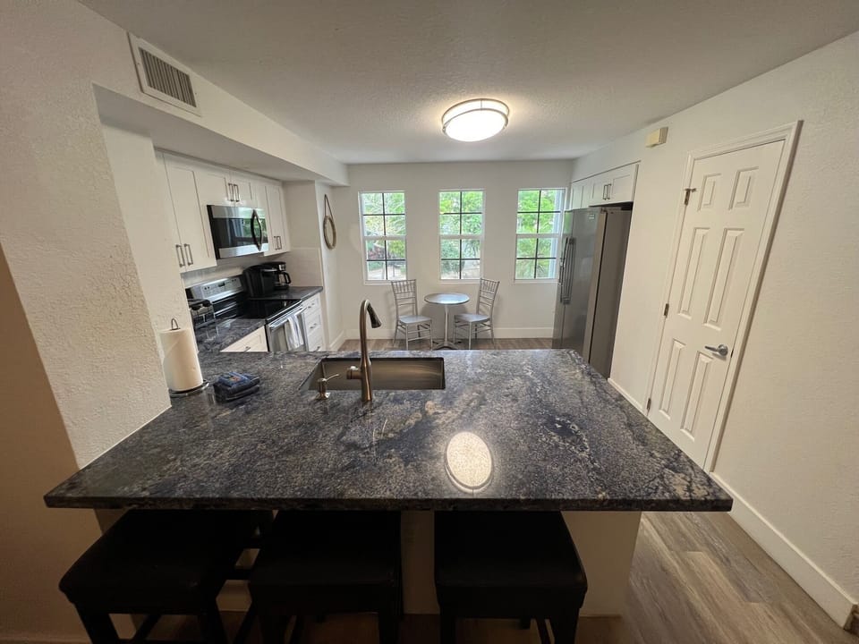 Kitchen W/Large Countertop and Bar.