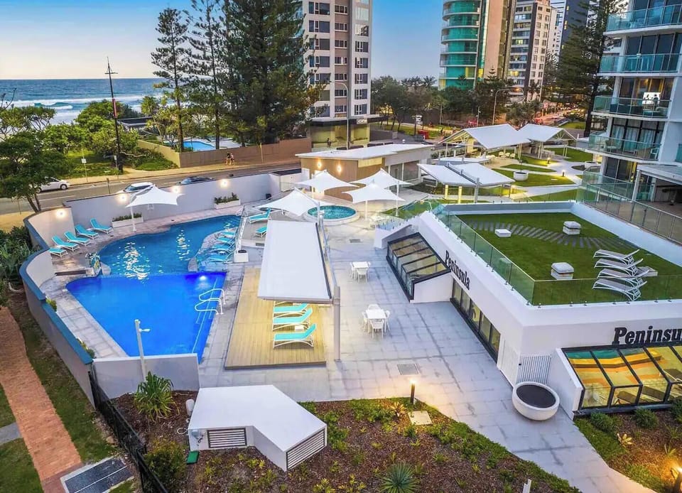 View of the heated outdoor pools, with the heated indoor pool on the right