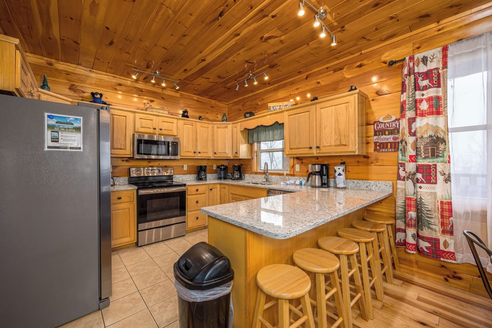 Fully Equipped kitchen with all you need to make morning coffee to full dinners for your group!