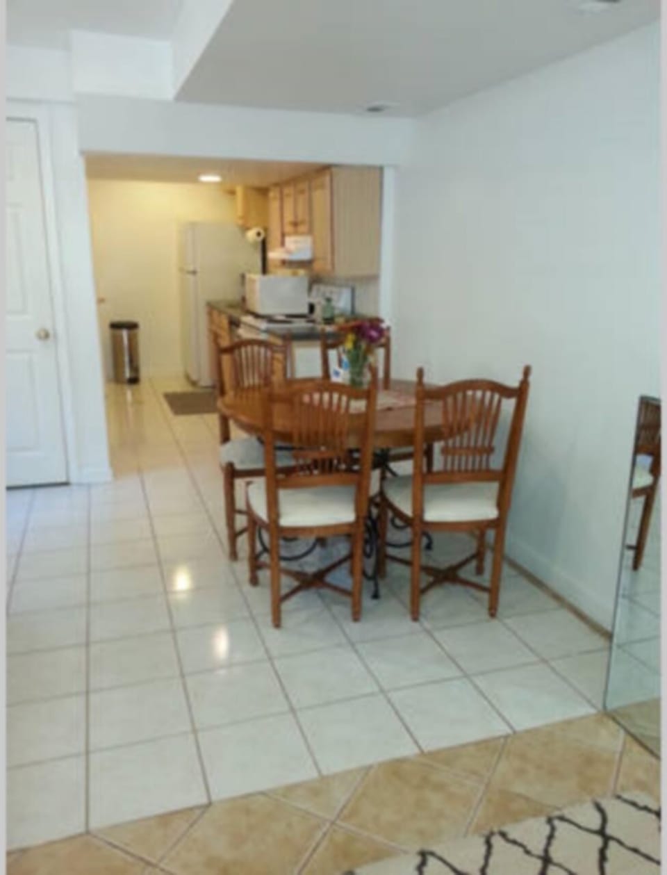 view of the kitchen with dining table for 4 with option for 6.