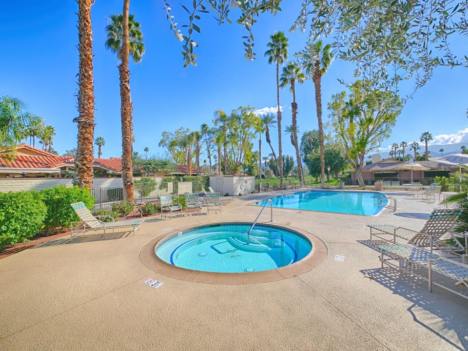 Jacuzzi  and pool 50 feet from rer patio.