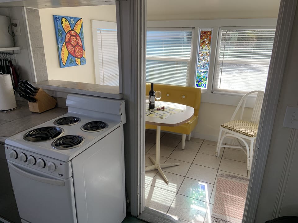 The eating room leads to the kitchen and it has a pass-through to it!