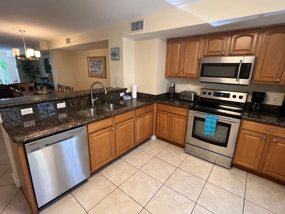 Modern Kitchen W/All Wood Cabinets and New Stainless-Steel Appliances