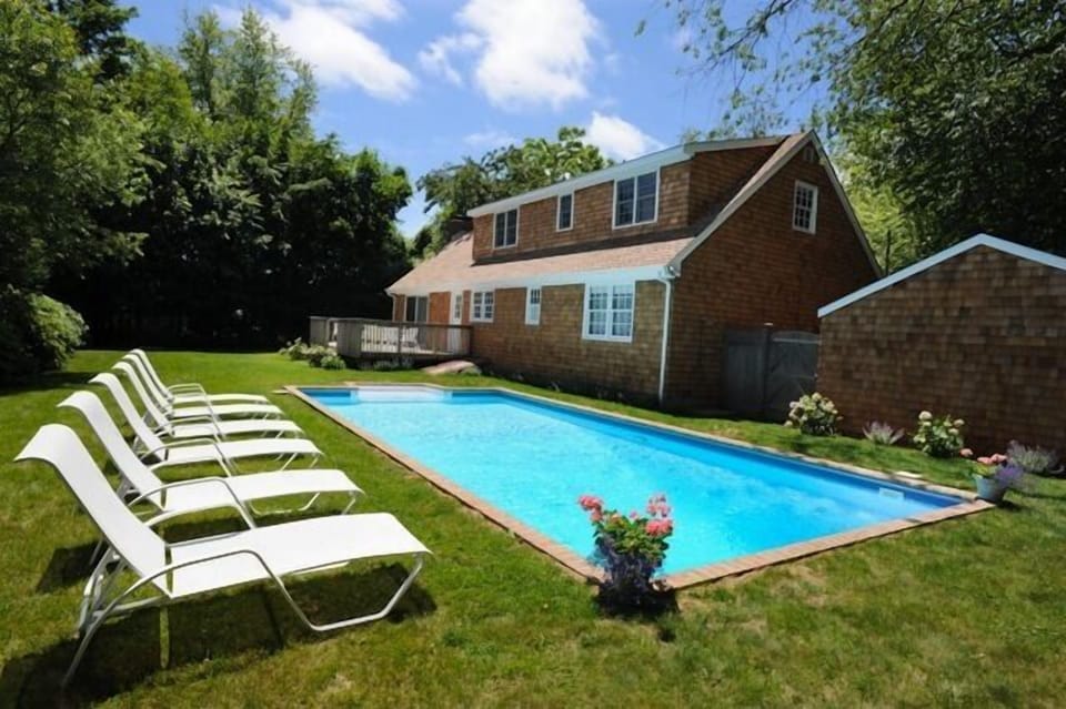 East Hampton Village - relax poolside amidst complete privacy and sunshine.
